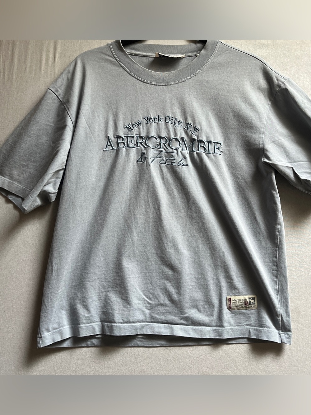Vintage Abercrombie & Fitch Men's Light Blue Raised Logo T-Shirt L
